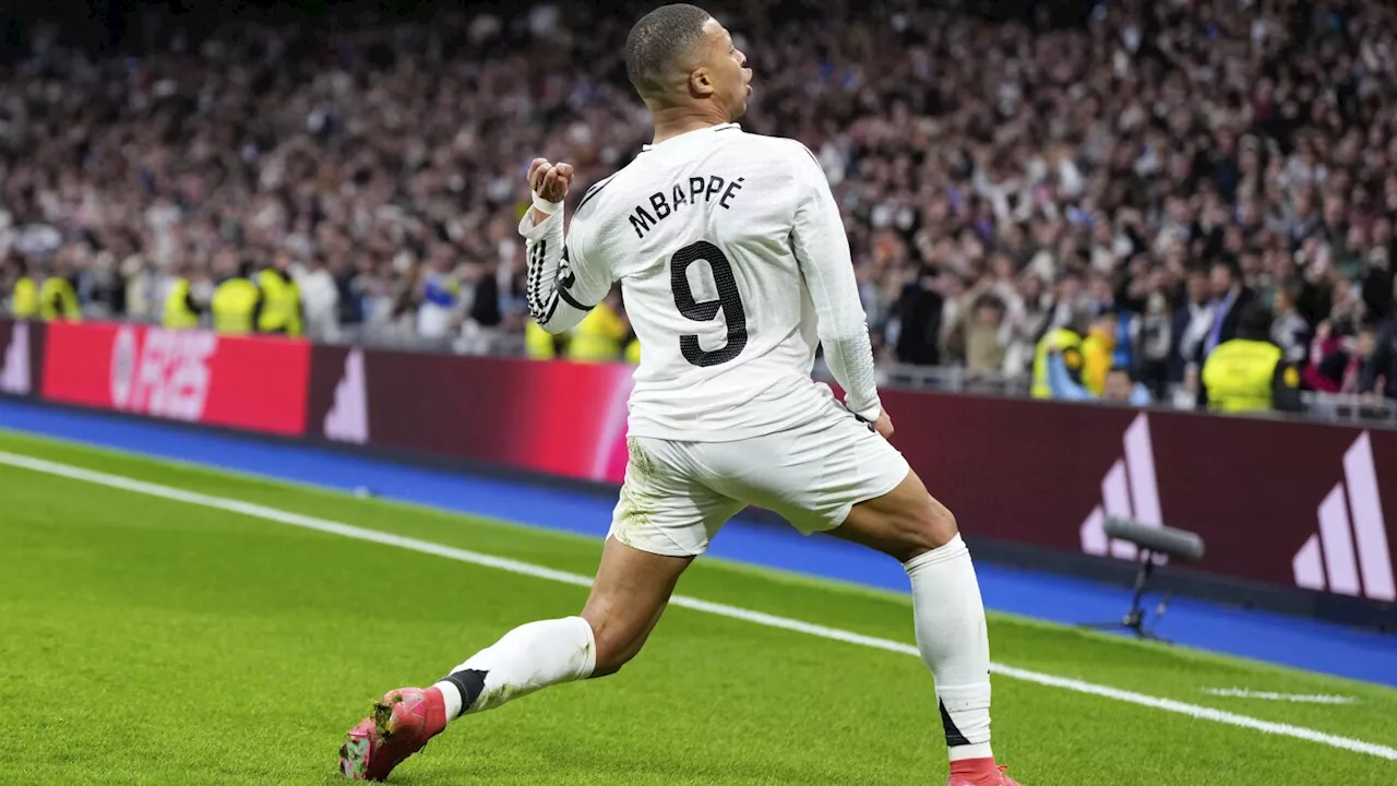Mbappé and Vinícius score as Real Madrid beats Rayo to join Barcelona at the top of Spanish league