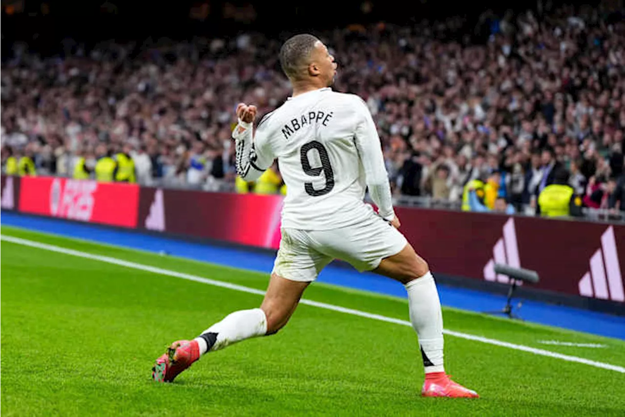 Mbappé and Vinícius score as Real Madrid beats Rayo to join Barcelona at the top of Spanish league