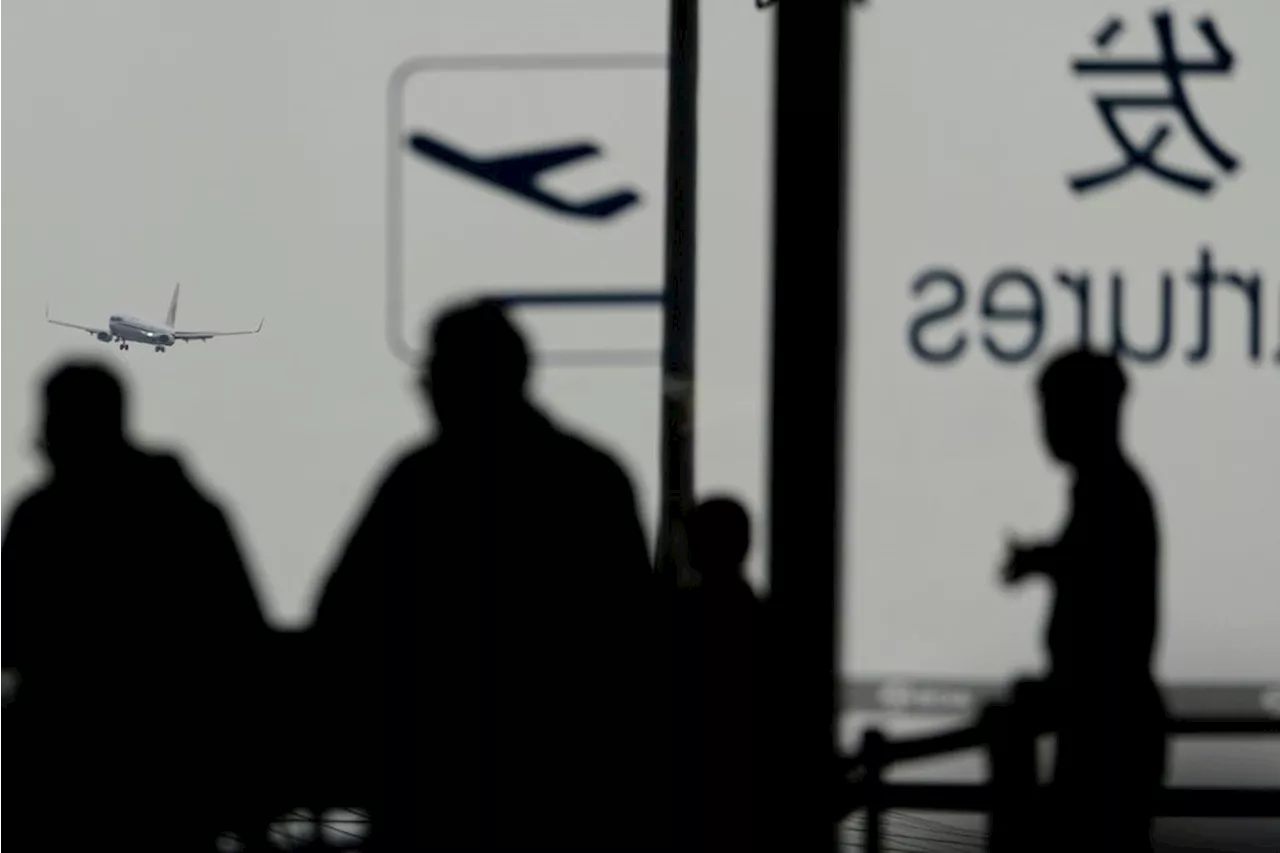High winds and sandstorms prompt Beijing to cancel hundreds of flights and close parks