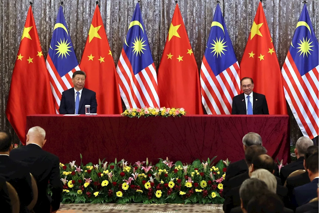 Anwar hosts state dinner for Xi Jinping after high-level talks and signing of 31 bilateral deals