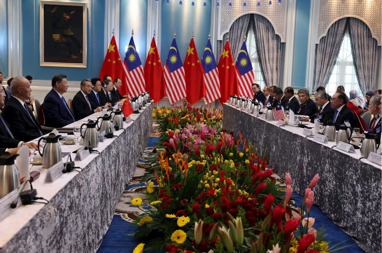 China's Xi expresses commitment to enhancing cooperation with M'sia