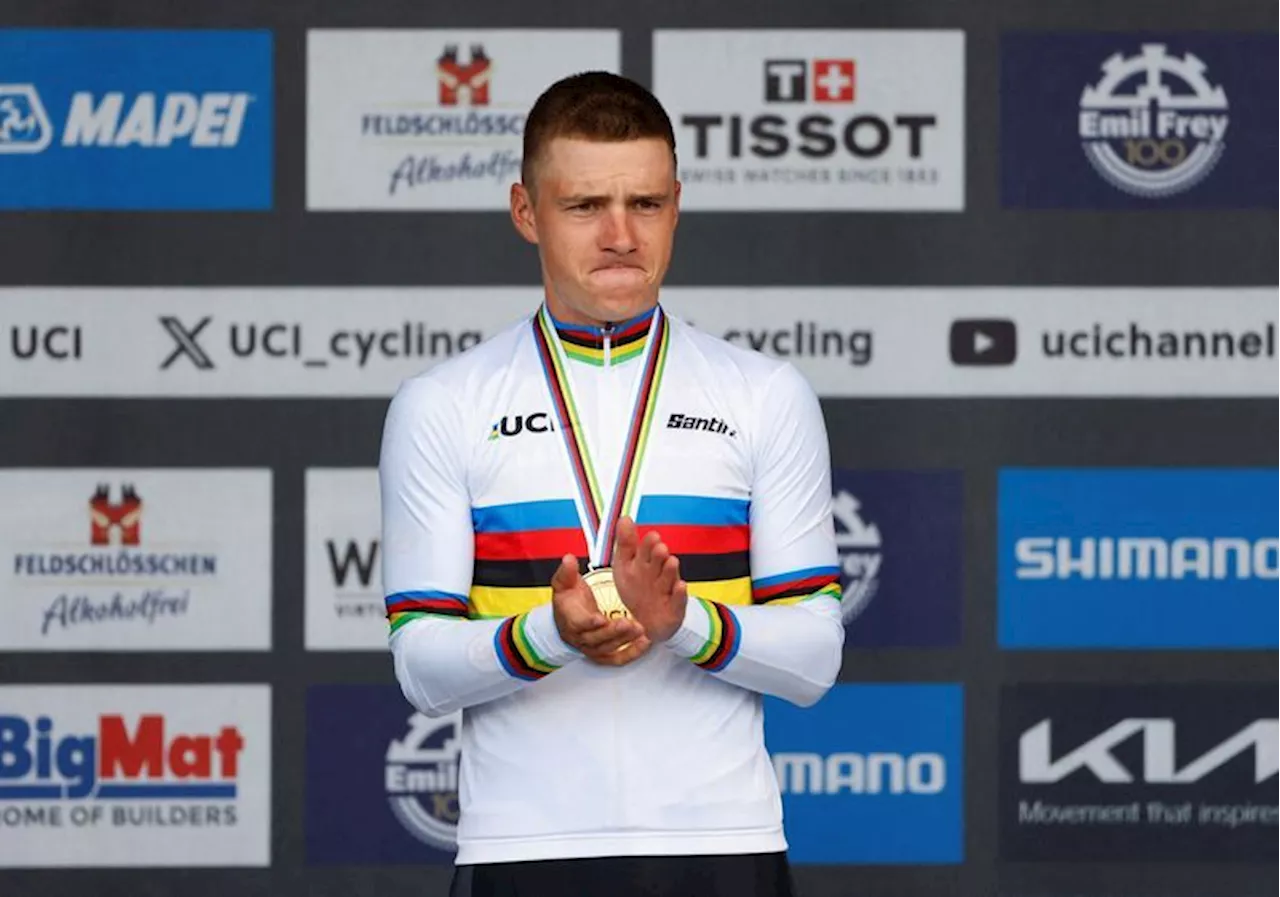 Cycling-Evenepoel fends off Van Aert in winning return after horror crash