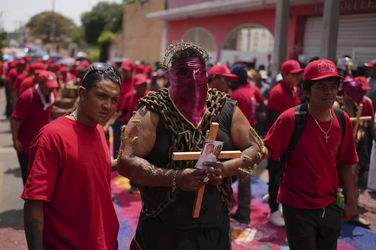 Men toting chains and pierced with cactus keep a Good Friday tradition in Atlixco, Mexico