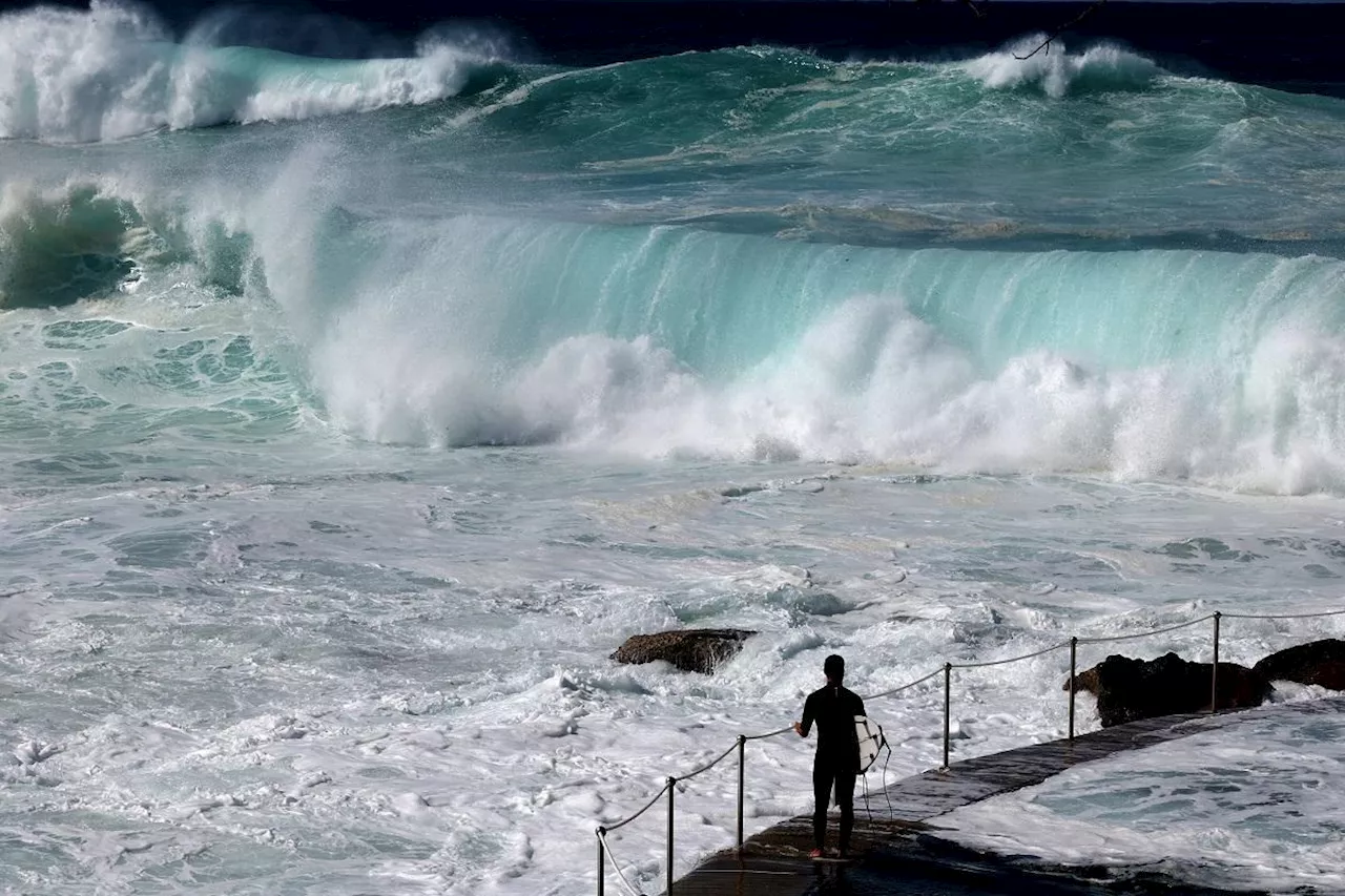Six drowning deaths as huge waves hit Australian coast
