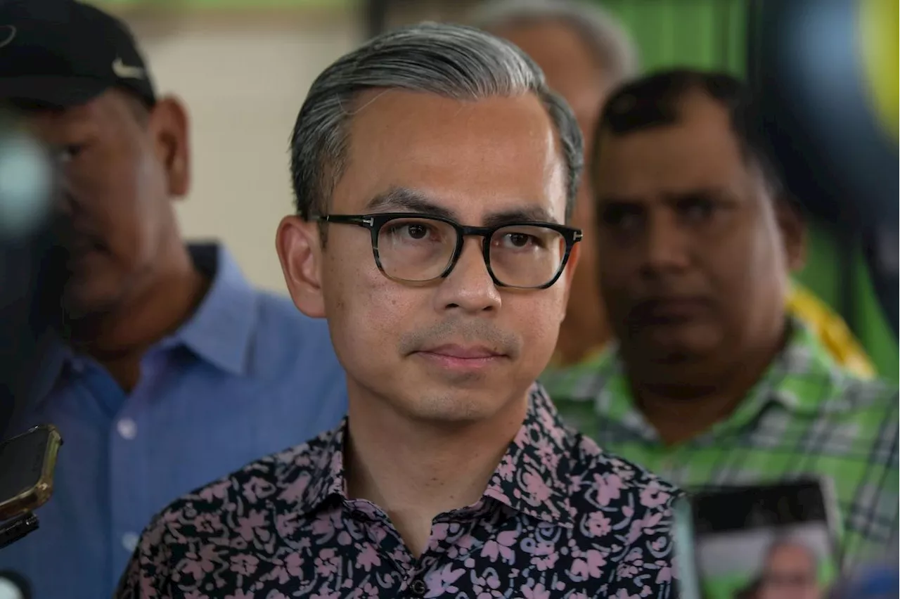 Detention of Sin Chew editors over flag illustration lawful, says Fahmi