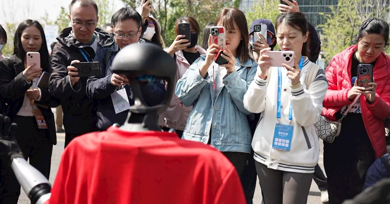 China's robots race against humans — and their U.S. counterparts