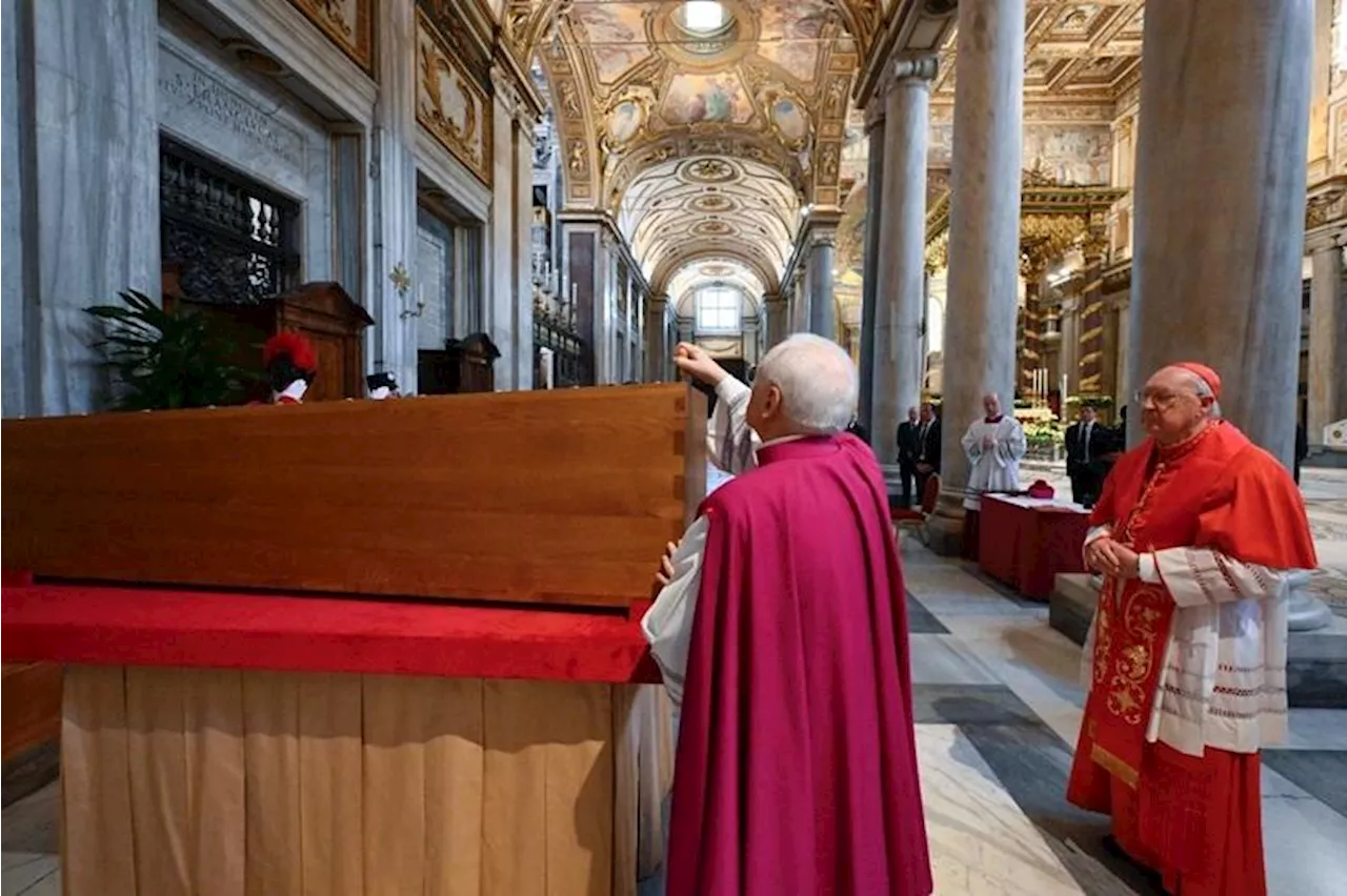 Vatican releases photos of burial of Pope Francis' coffin