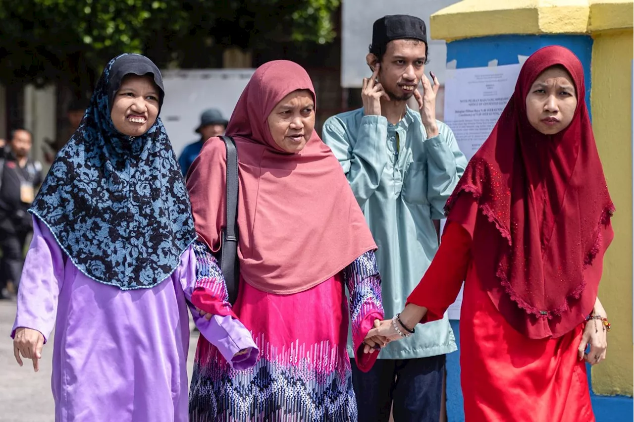 Ayer Kuning polls: Single mum does not deprive autistic children of voting