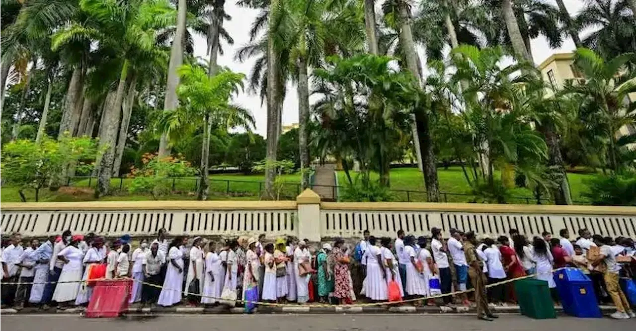 Christians join to help Buddhist pilgrims at sacred exposition