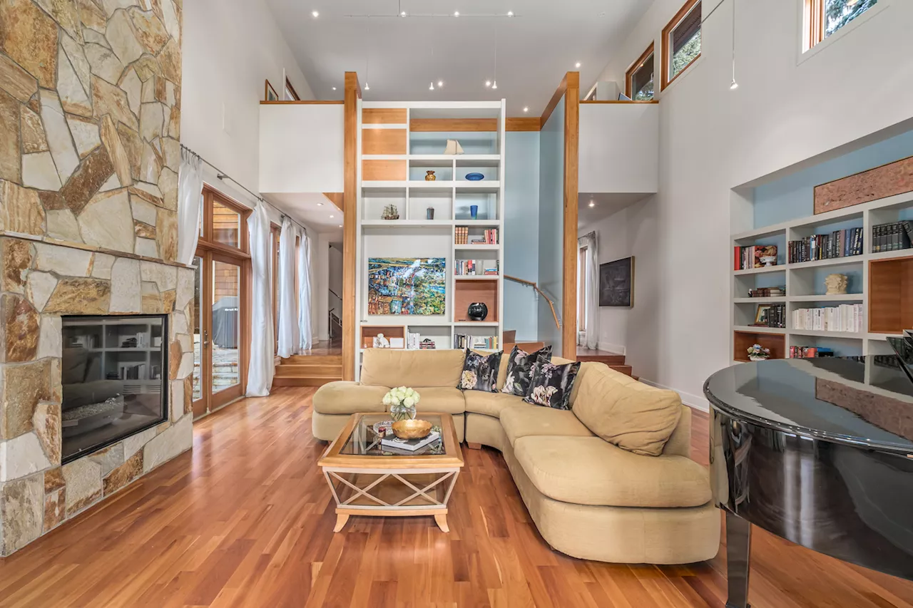 Architectural Masterpiece: Custom-Built Home with Soaring Ceilings and Hidden Staircase