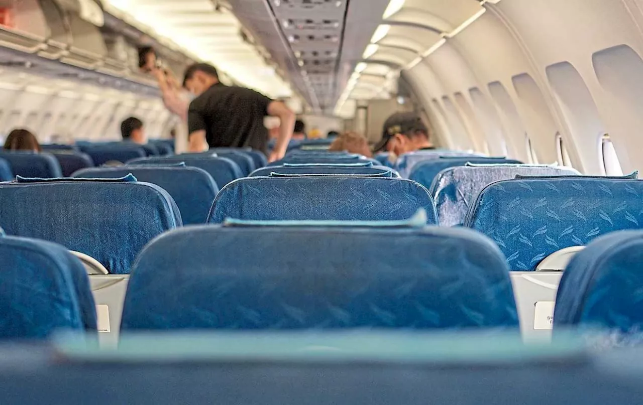 QuickCheck: Did a passenger on a flight from KL try to open the emergency door?