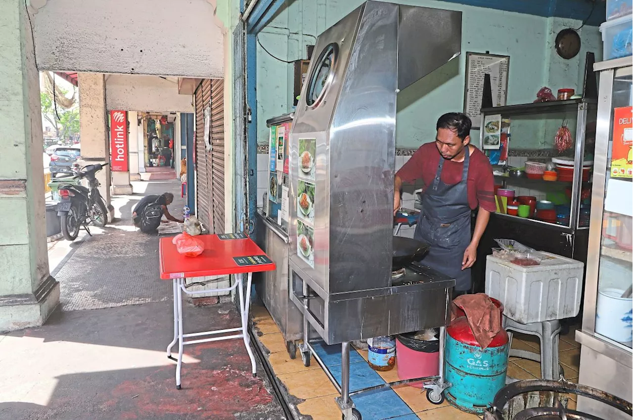 Traders keeping walkways clear