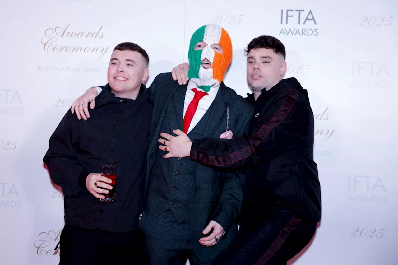 UK counter-terrorism unit investigates rappers Kneecap over Gaza-related videos as music stars rally behind band