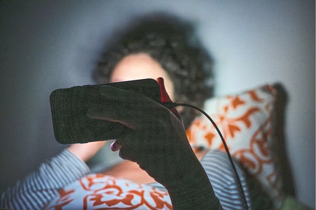 Scrolling on your phone in bed can ruin your sleep, study says