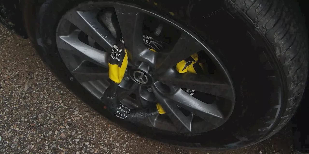 Cleveland creates online portal for driver to report tire booting at parking lots in the city