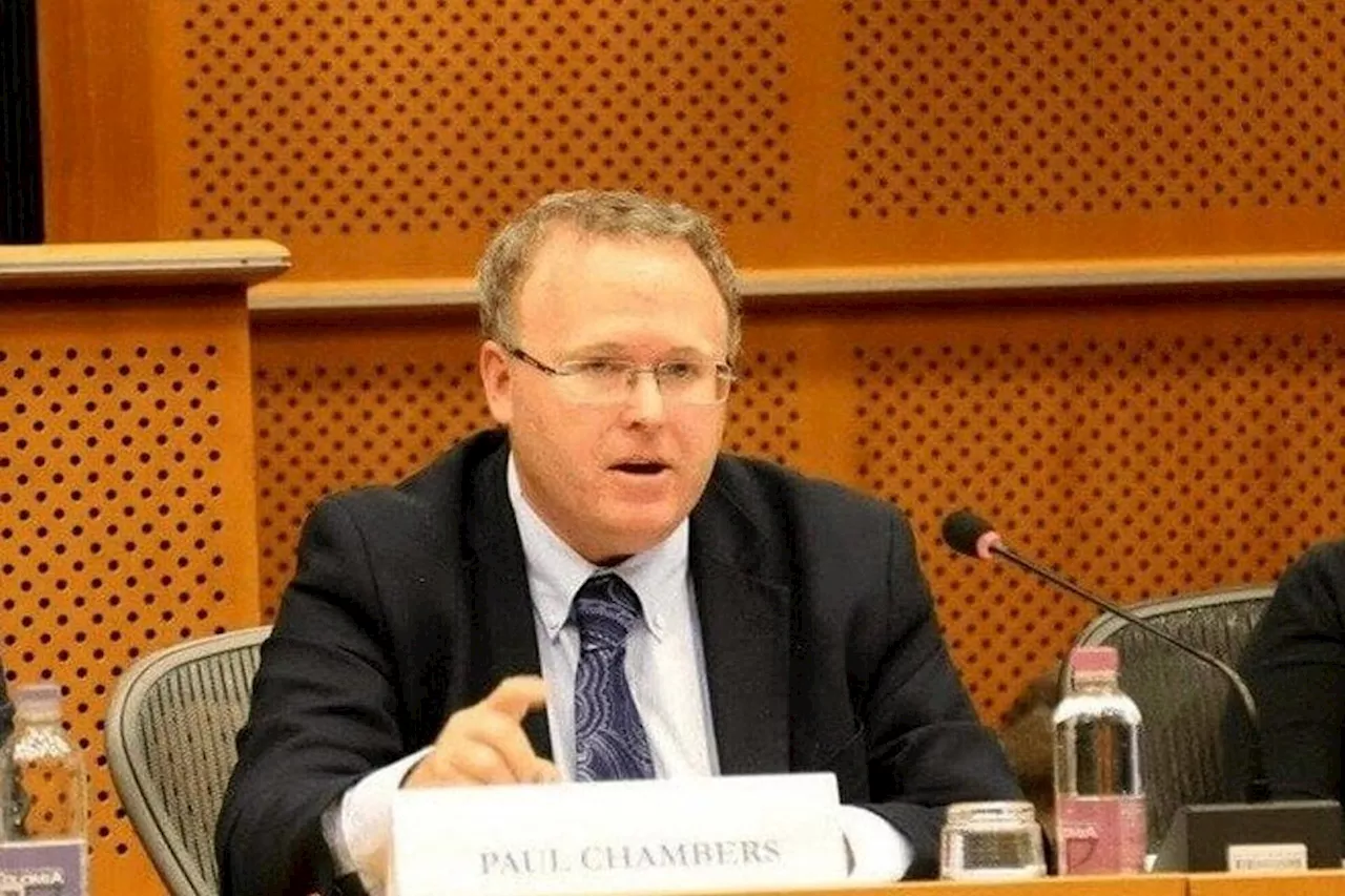 American academic in limbo in Thailand over royal insult case, family says