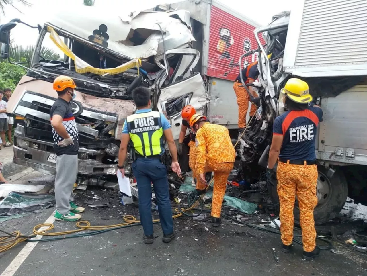 Driver killed, 4 injured in collision among 3 cargo trucks