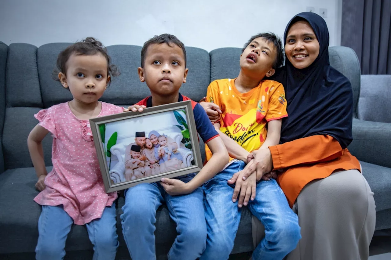 Daughter cries in her sleep every night, says widow of FRU personnel killed in Teluk Intan crash