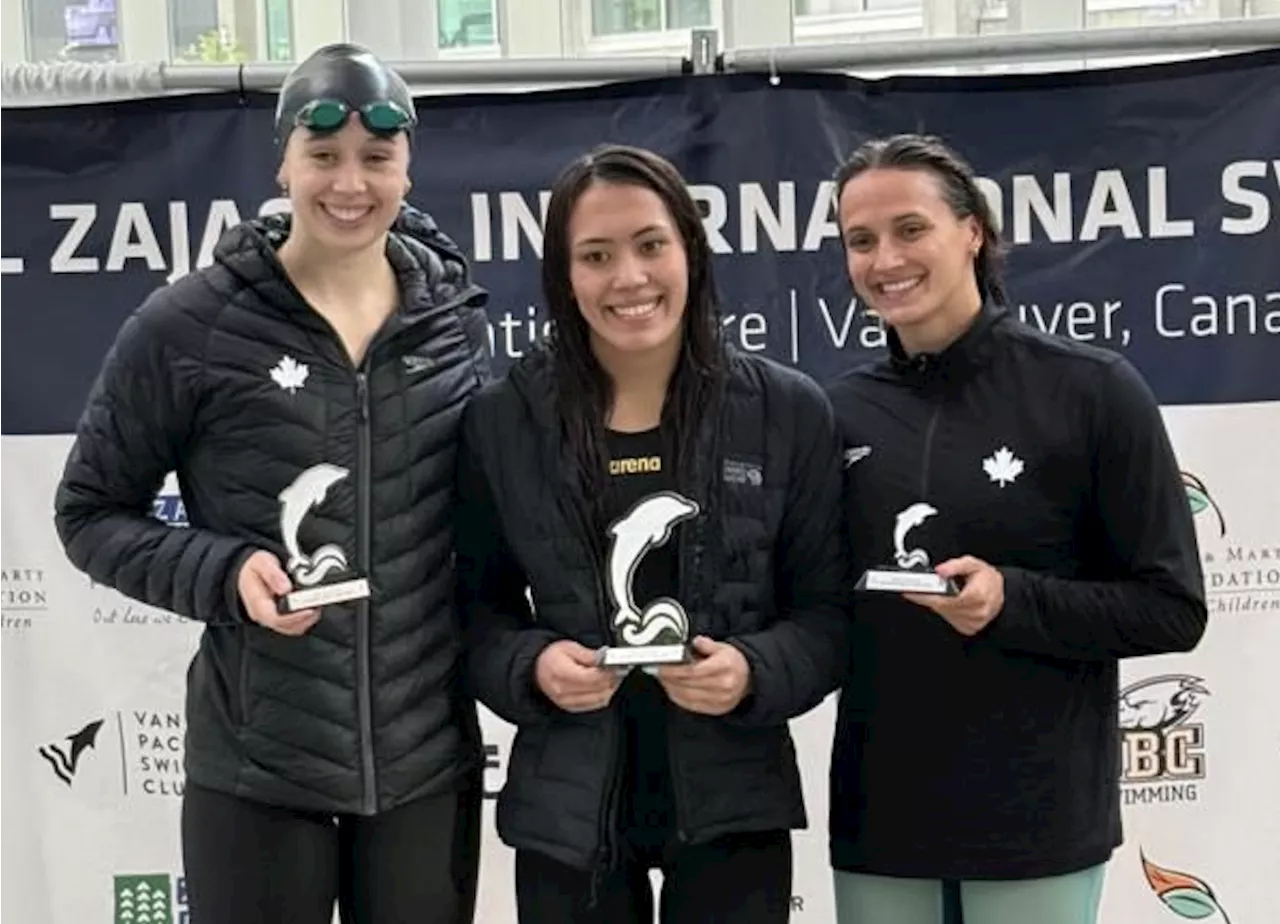 White outclasses Olympians in Canada swimfest