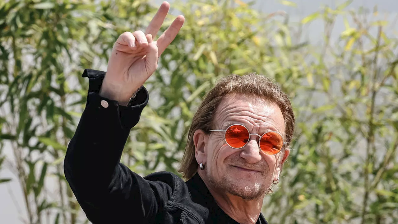 U2’s Bono calls to ‘stop war’ as band perform Sunday Bloody Sunday at award ceremony