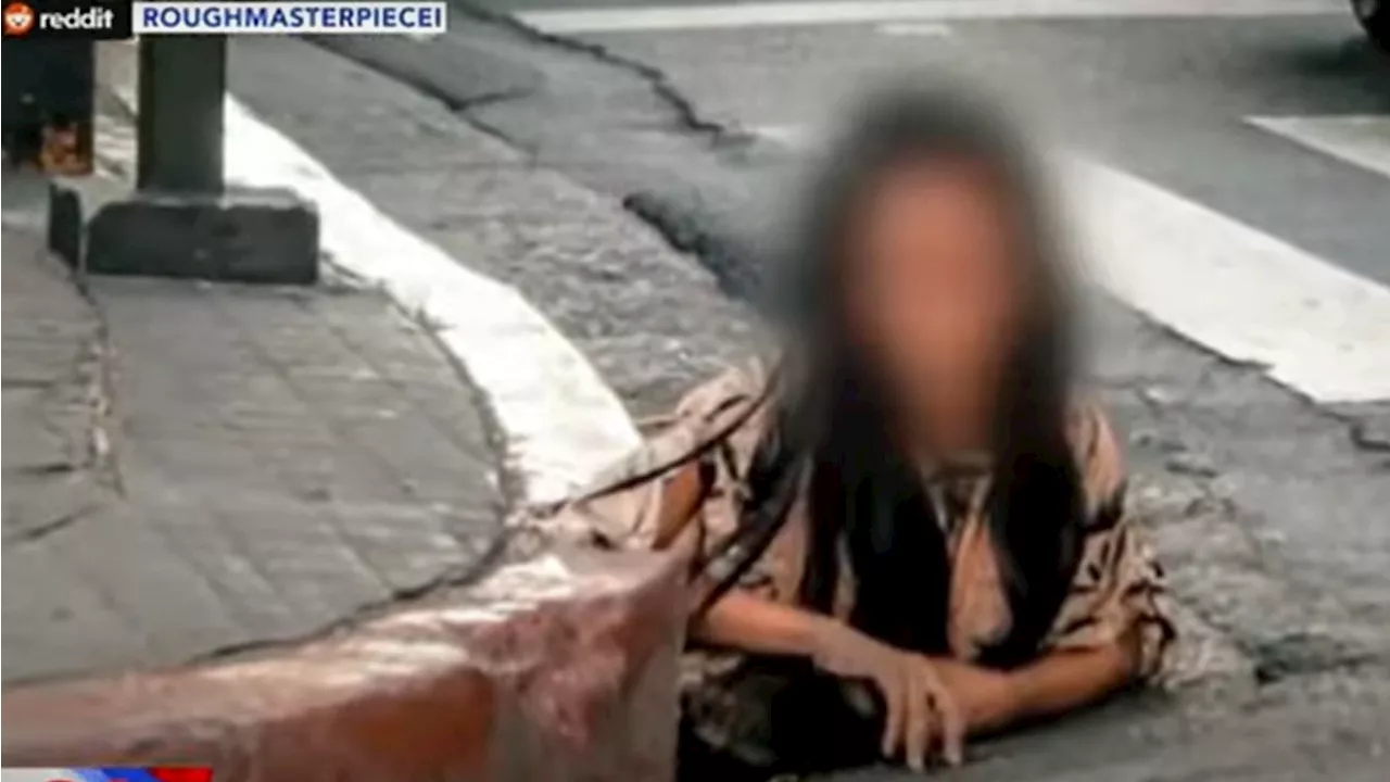 Mystery surrounds woman who suddenly emerged from Makati drainage hole