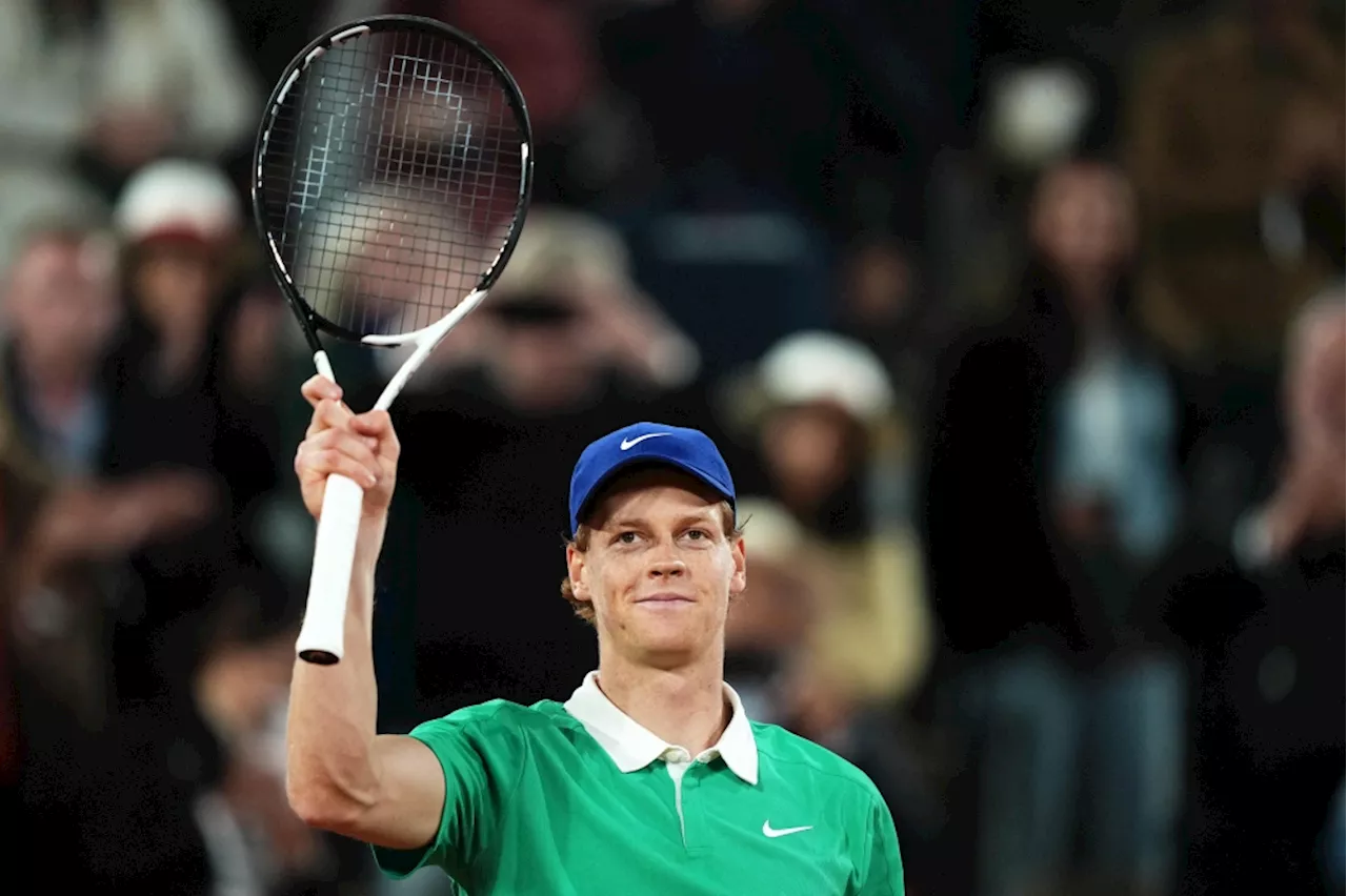 From suspension to second round: Tennis top seed Jannik Sinner overcomes Arthur Rinderknech in French Open