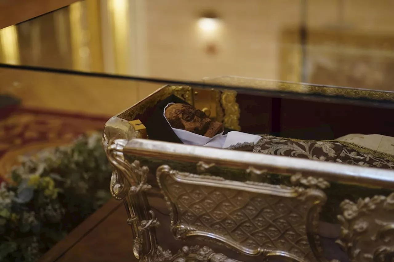 Throng of people flock to see a centuries-old Spanish saint's remains