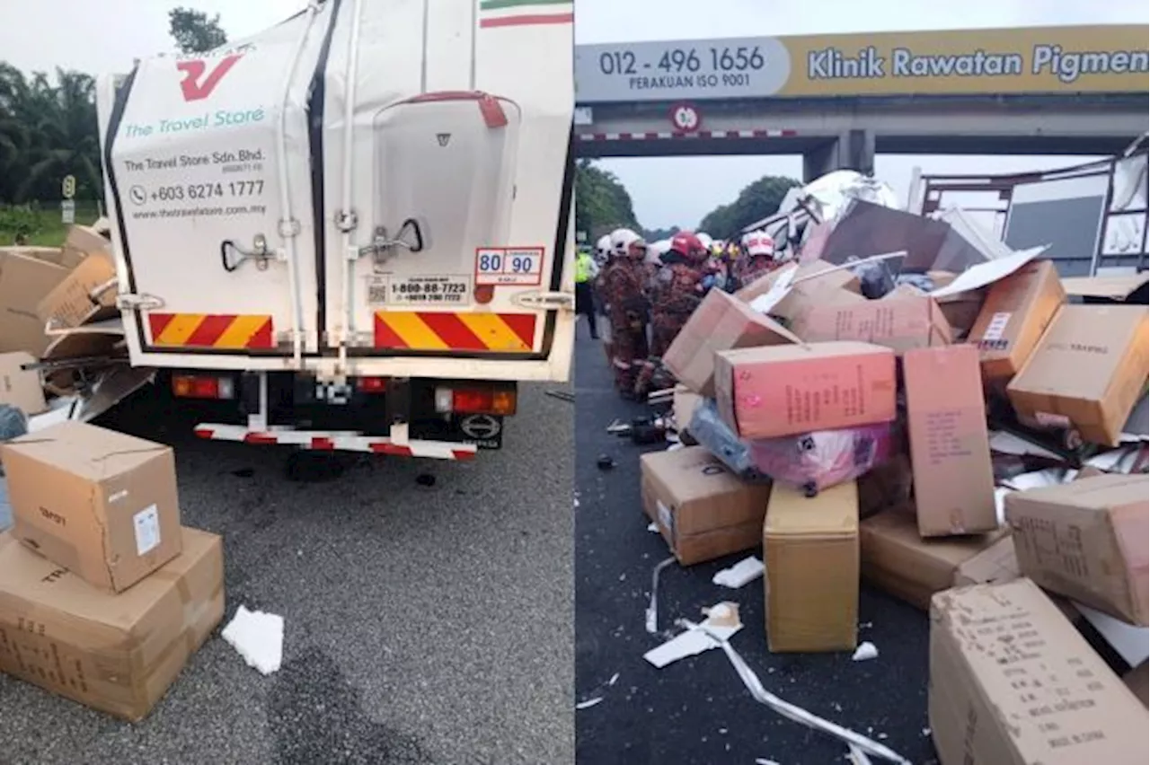 Box-laden lorry overturns on NSE, Bomba frees trapped attendant from wreckage