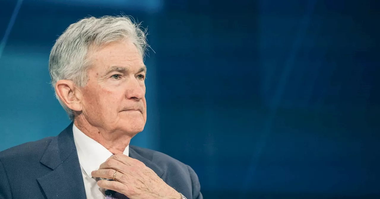 Federal Reserve holds rates steady as it warns of rising economic risks