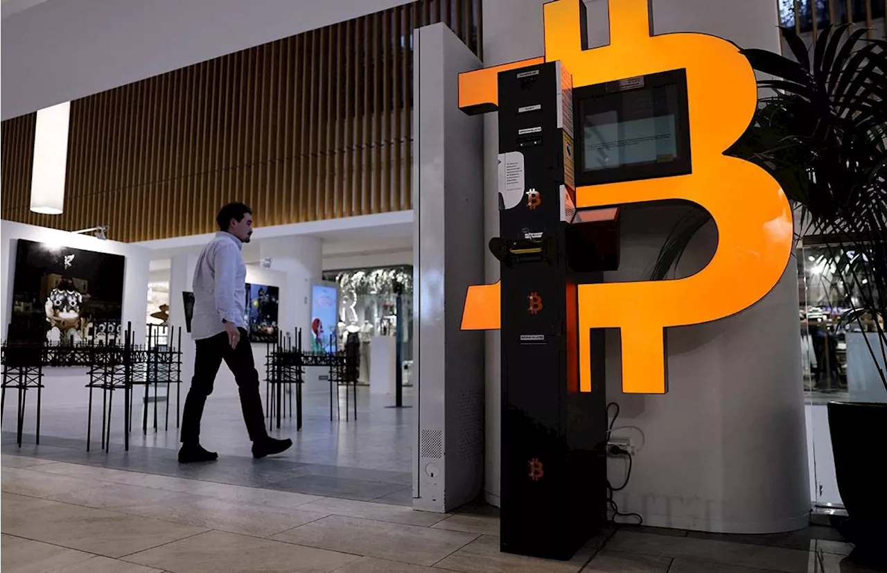 Bitcoin tops $100,000 for the first time