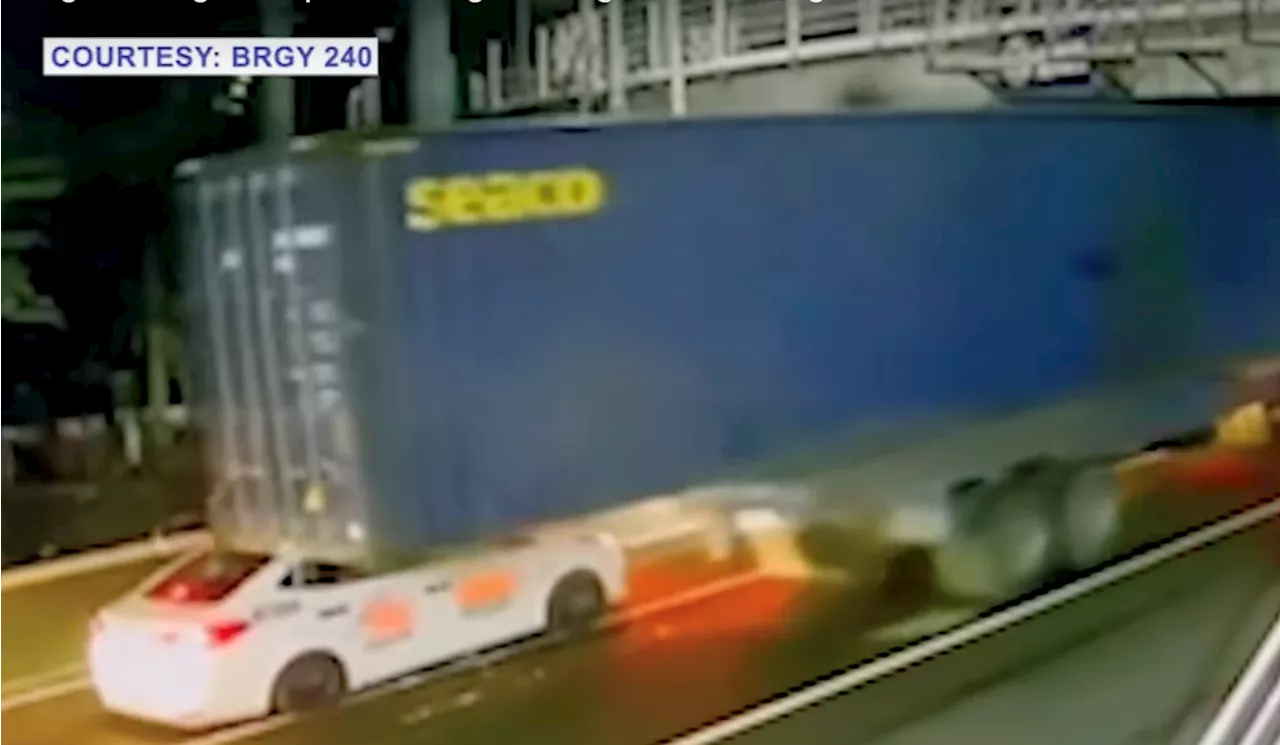Taxi, yupi ang bubong nang mabagsakan ng container ng trailer truck sa Maynila