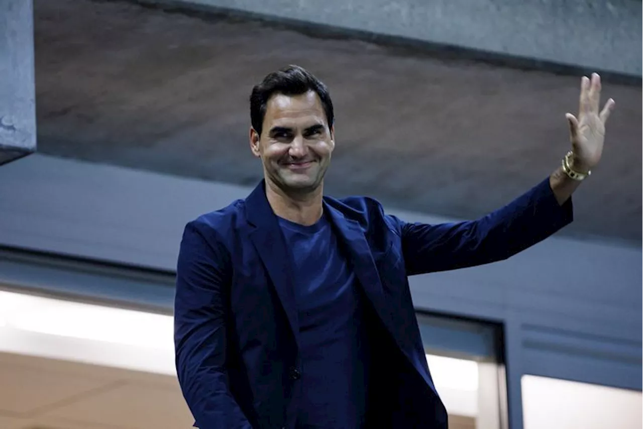 Motor racing-Federer waves the flag as Porsche takes lead at Le Mans