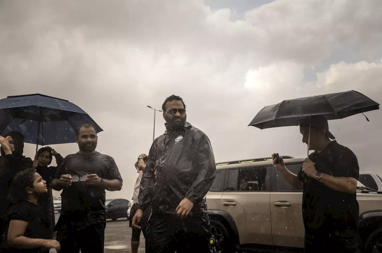 Monsoon-loving Indian expats chase rain in UAE desert