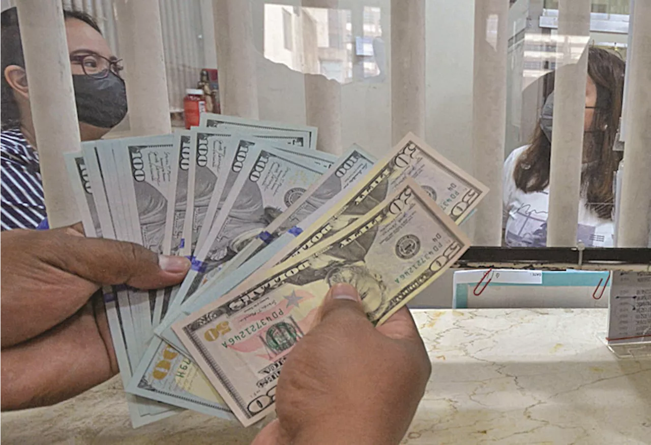 Peso plunges to 57.45 per dollar on rising crude prices