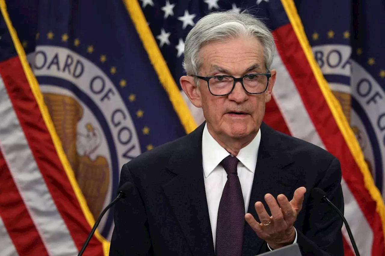 Fed keeps rates steady, expects higher inflation