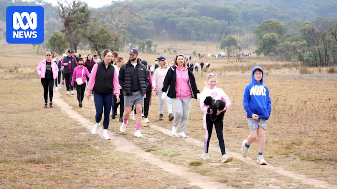 Hundreds join solidarity walk in support for woman attacked while running on Canberra trail