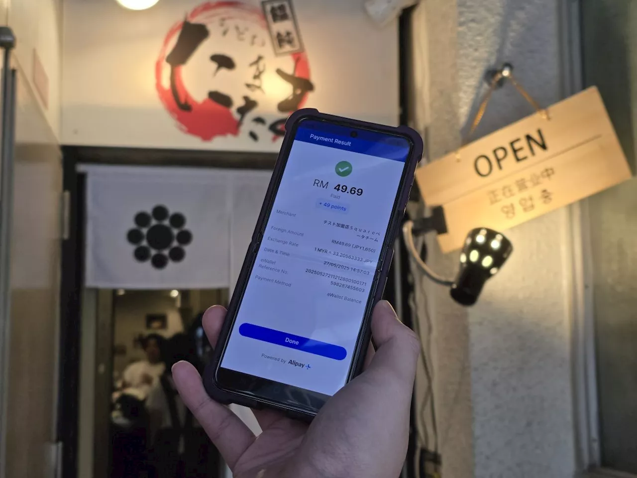 Converging on cashless: Taking the TNG eWallet app on a spin overseas