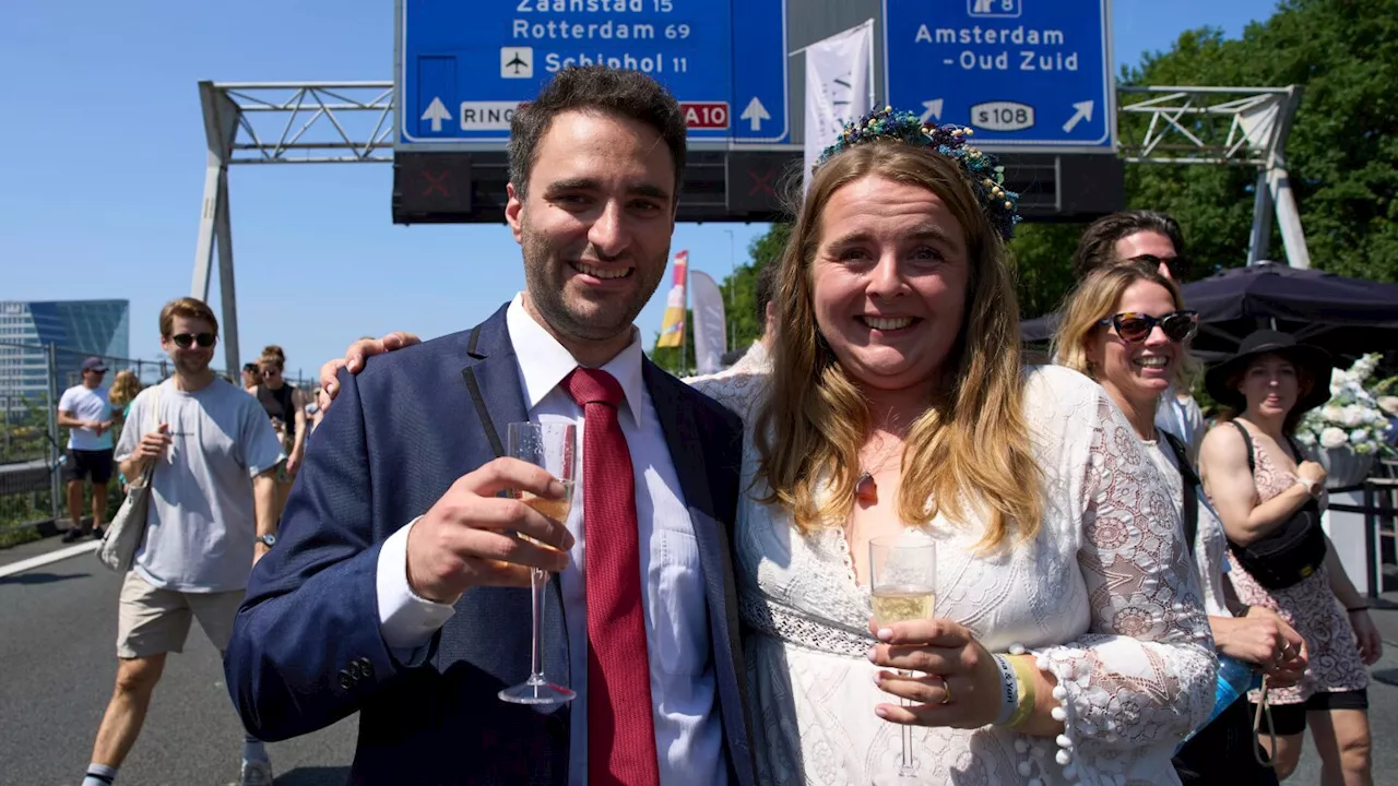 Couples tie the knot during a festival on an Amsterdam ring road