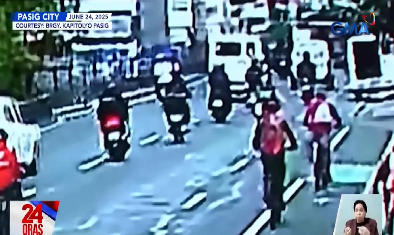 Siklista, nasagasaan ng SUV matapos matumba nang tamaan ng pinto ng nakaparadang van sa bike lane