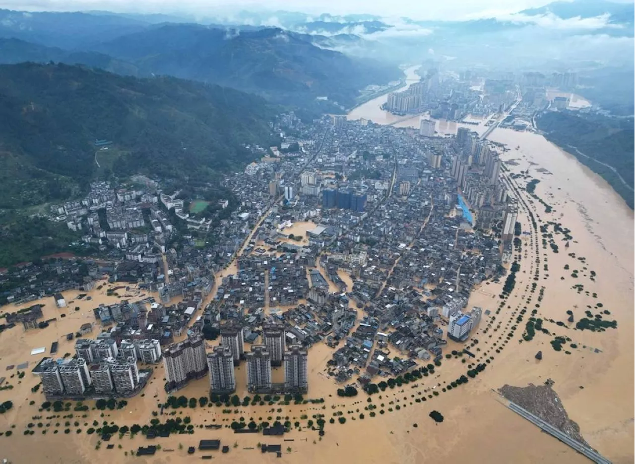 Southwest China floods force over 80,000 to flee
