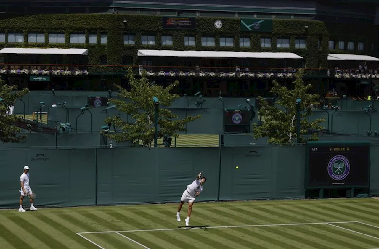 Tennis-Wimbledon set for scorching start as heatwave looms