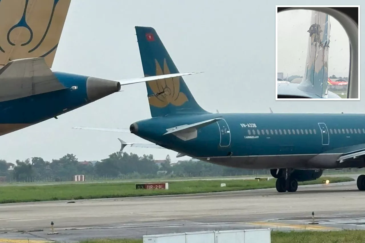 Vietnam Airlines suspends 4 pilots after Boeing jet collides with parked Airbus on runway, slicing through tail fin