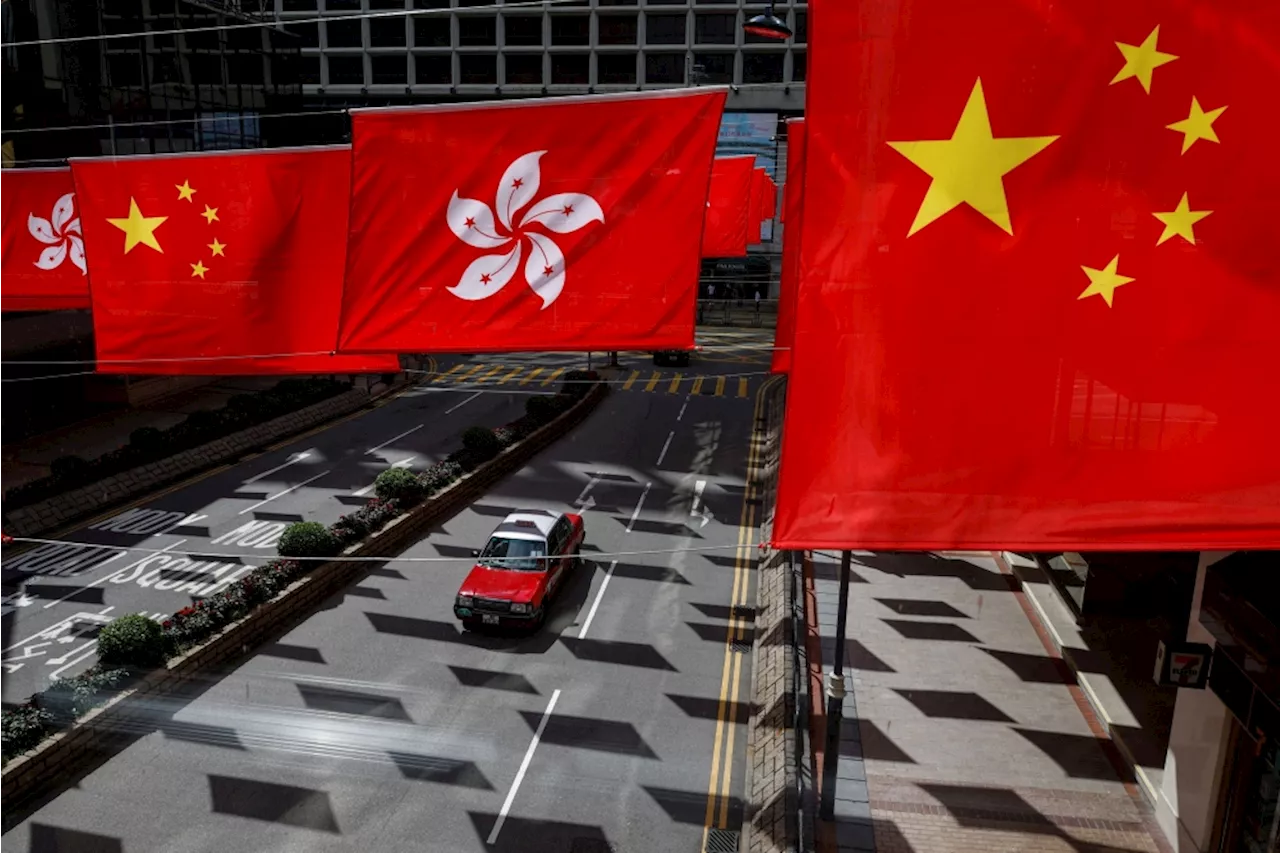 Drunk passenger nabbed for knifing Hong Kong taxi driver after being woken at stop