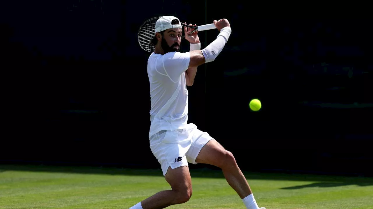 Aussie marathon man strikes at Wimbledon; Thompson defies bad back to pull off monster comeback