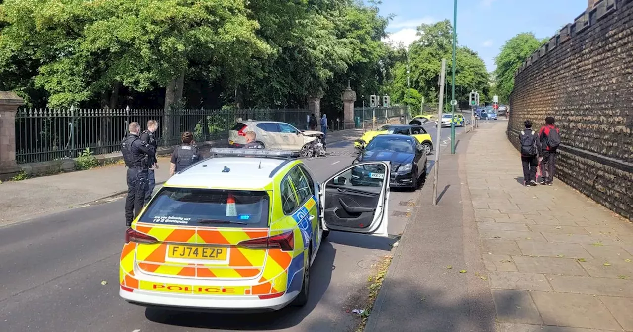 Ambulances and police called to crash blocking road outside school