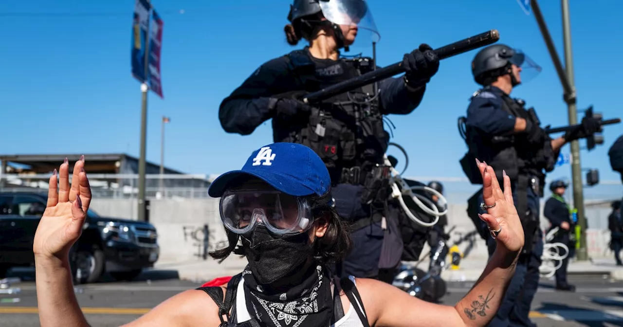 L.A. unrest live updates: Crowds protesting immigration raids ordered to leave downtown
