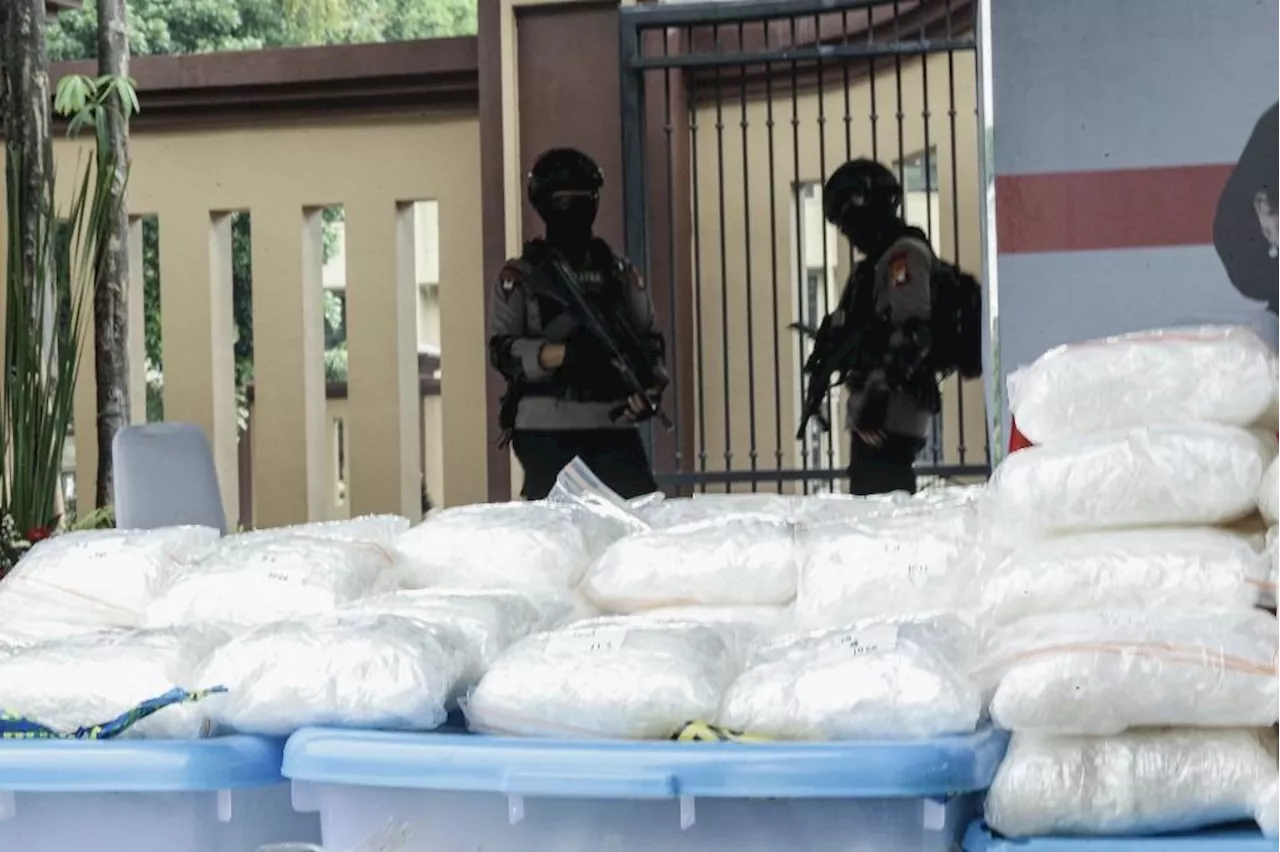 Batam court hands down life sentence to 10 ex-cops for selling meth