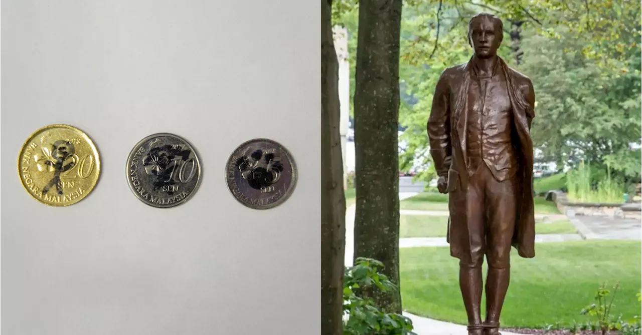 CIA Shares Photo Of Malaysian Coins Left At Statue Of American Spy