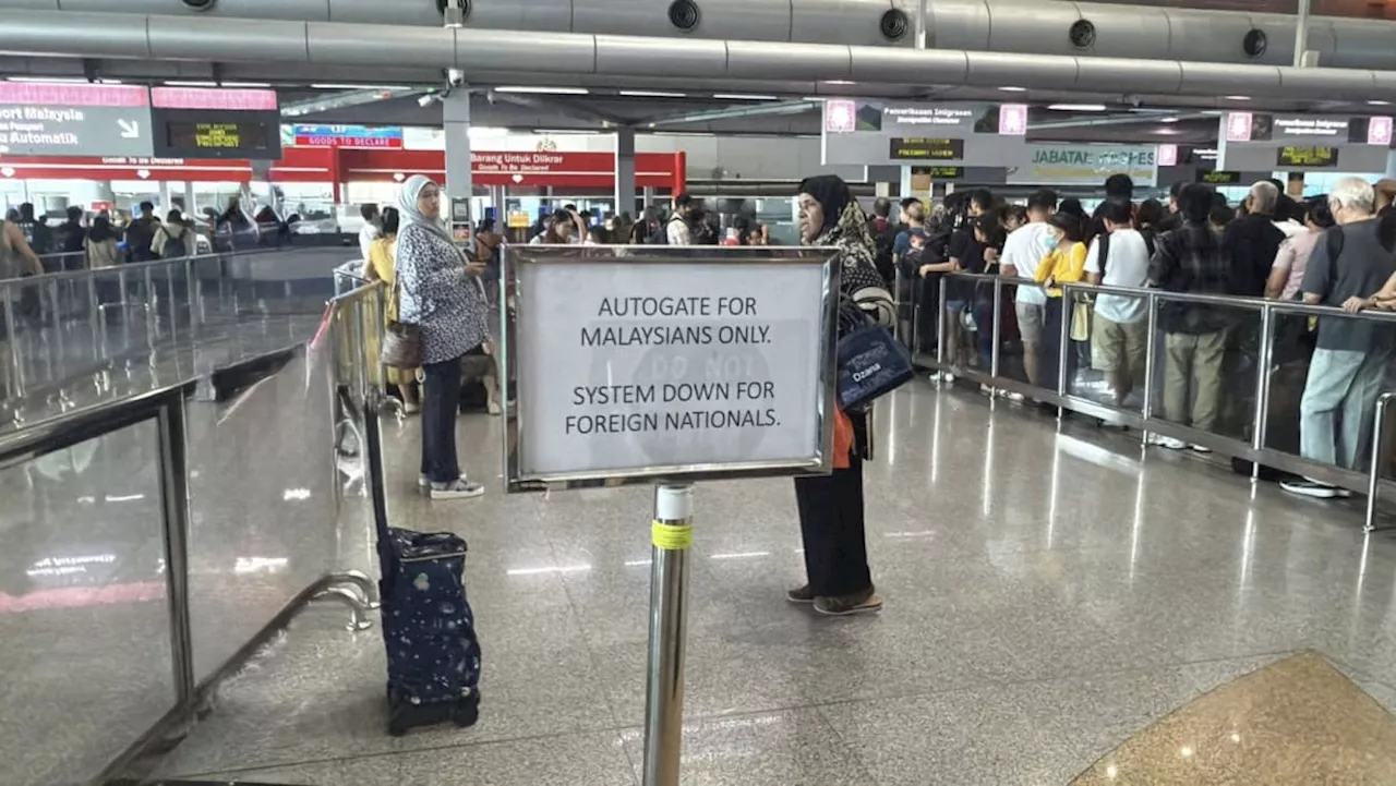 Long queues at Malaysia's checkpoints after country's worst breakdown in autogates affecting foreign travellers