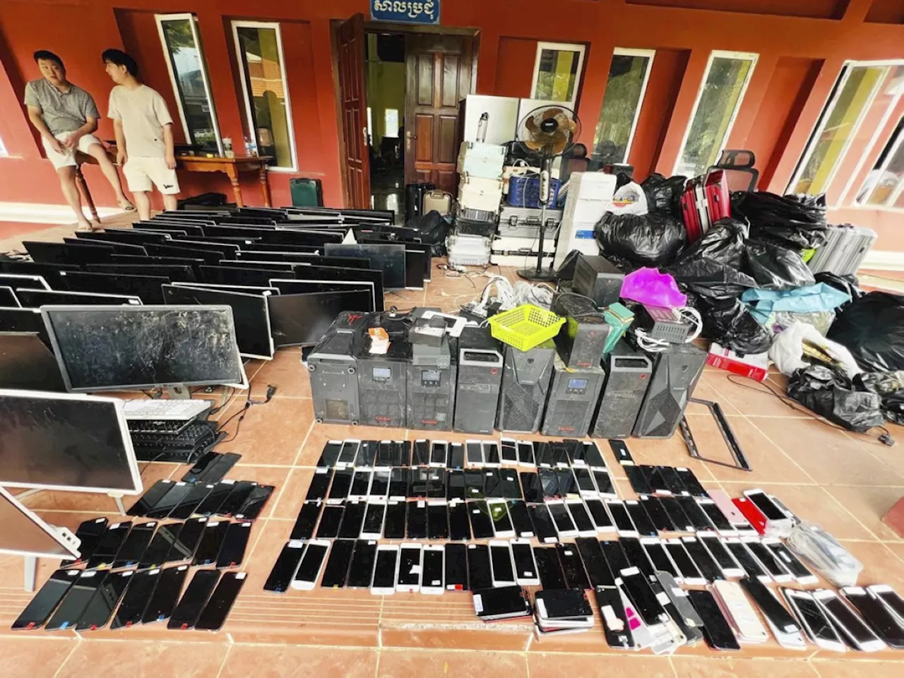 Cambodia nabs 2,100 in raids on scam hubs